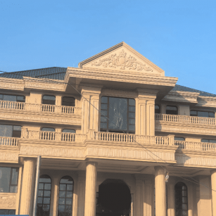 湛江黄金麻别墅外墙干挂石材效果示例