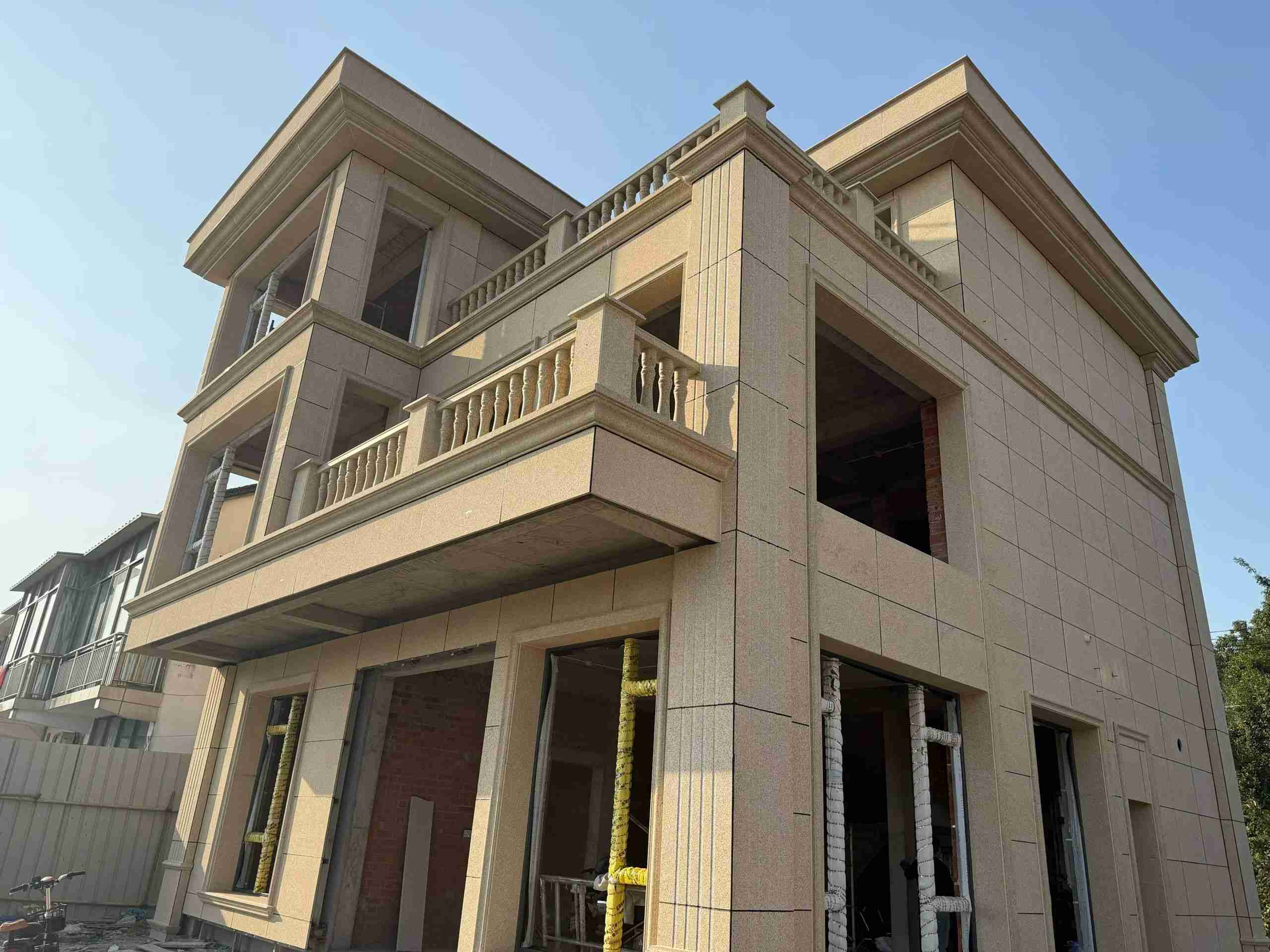 湛江 黄金麻花岗岩石材荔枝面外墙干挂效果展示